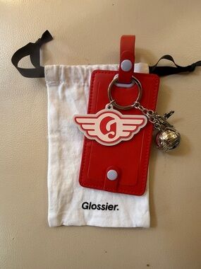 GLOSSIER D.C. Luggage Tag